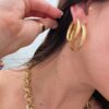 Argollas con dibujo grabado.