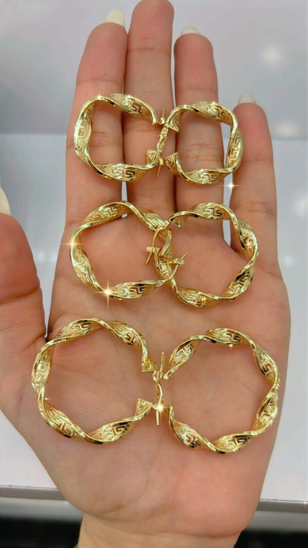 Argollas Versace Torcidas